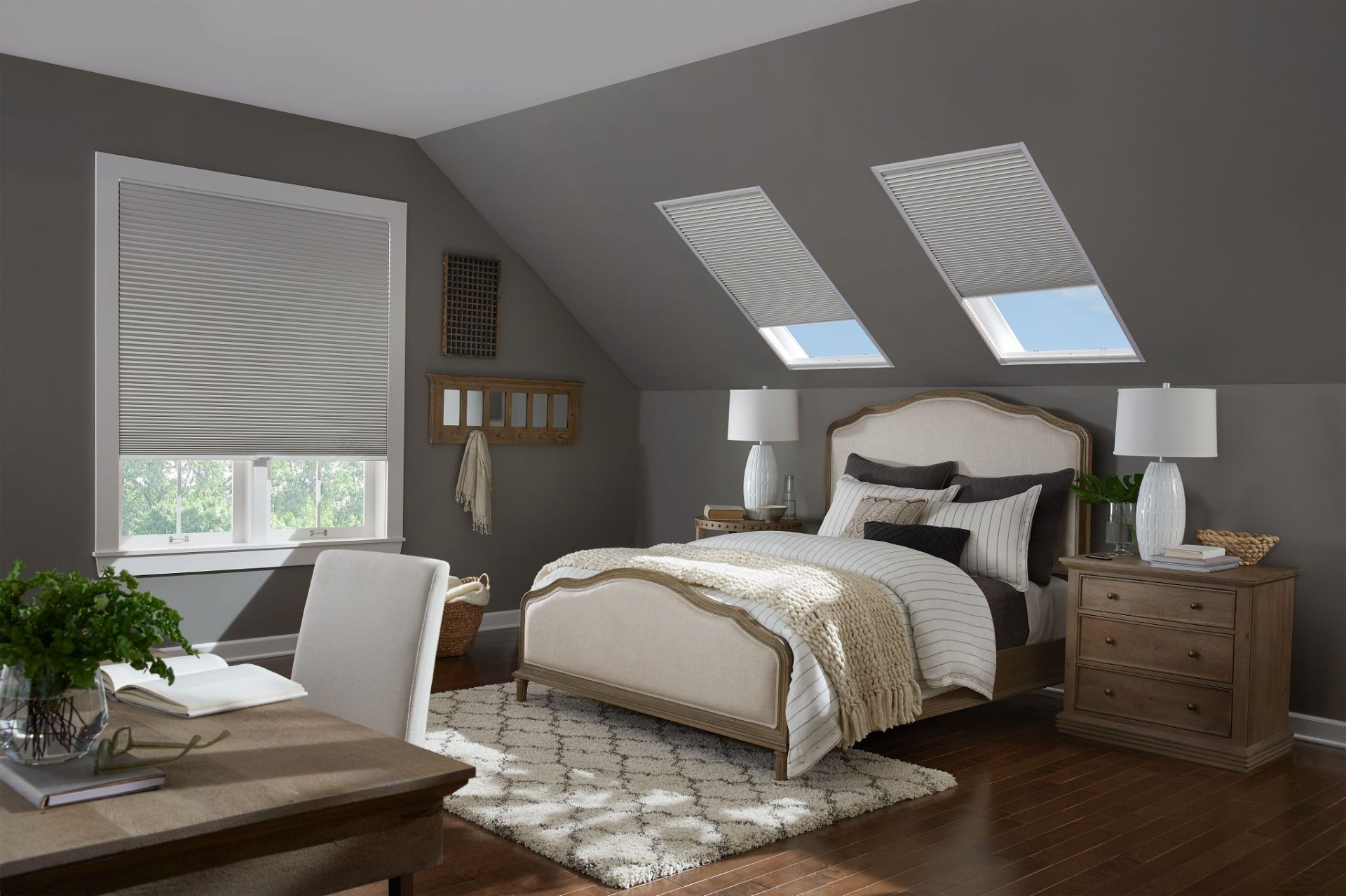 Automated skylight shades in bedroom