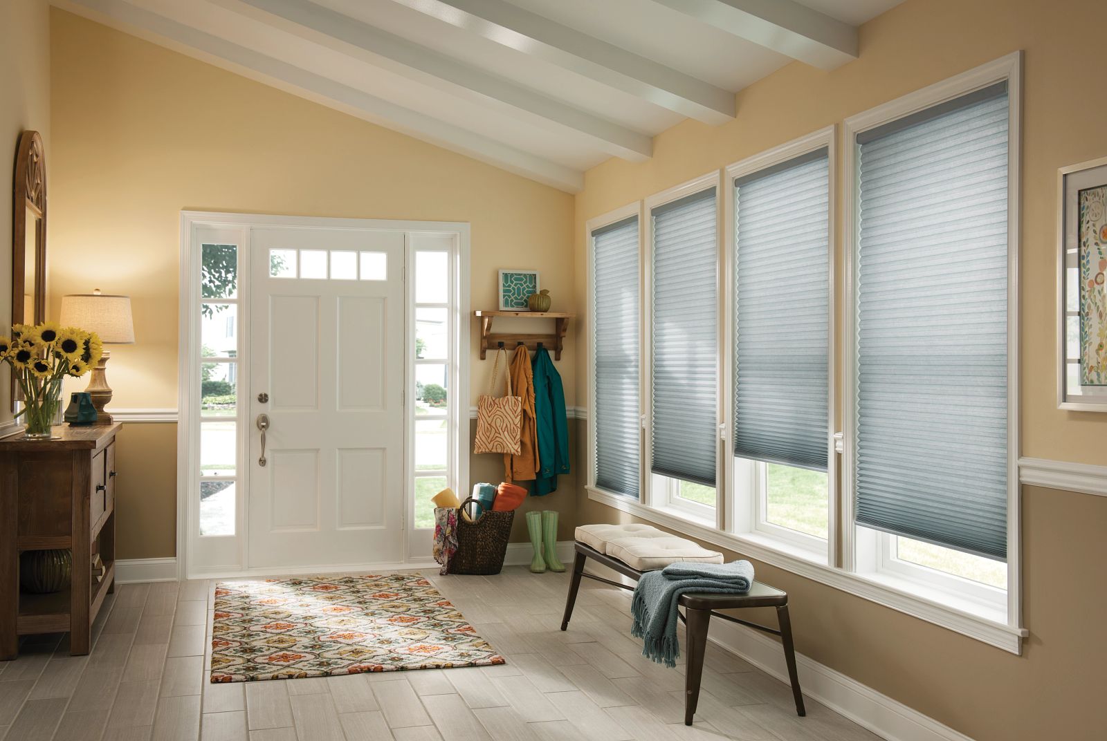 Honeycomb shades in bright foyer