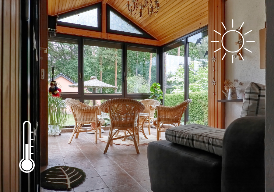 A bright sunroom with whicker chairs