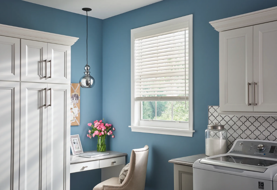 white faux wood blinds in a kitchen